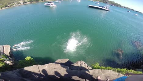Young-man-doing-a-backflip-from-a-cliff-Sydney-Australia